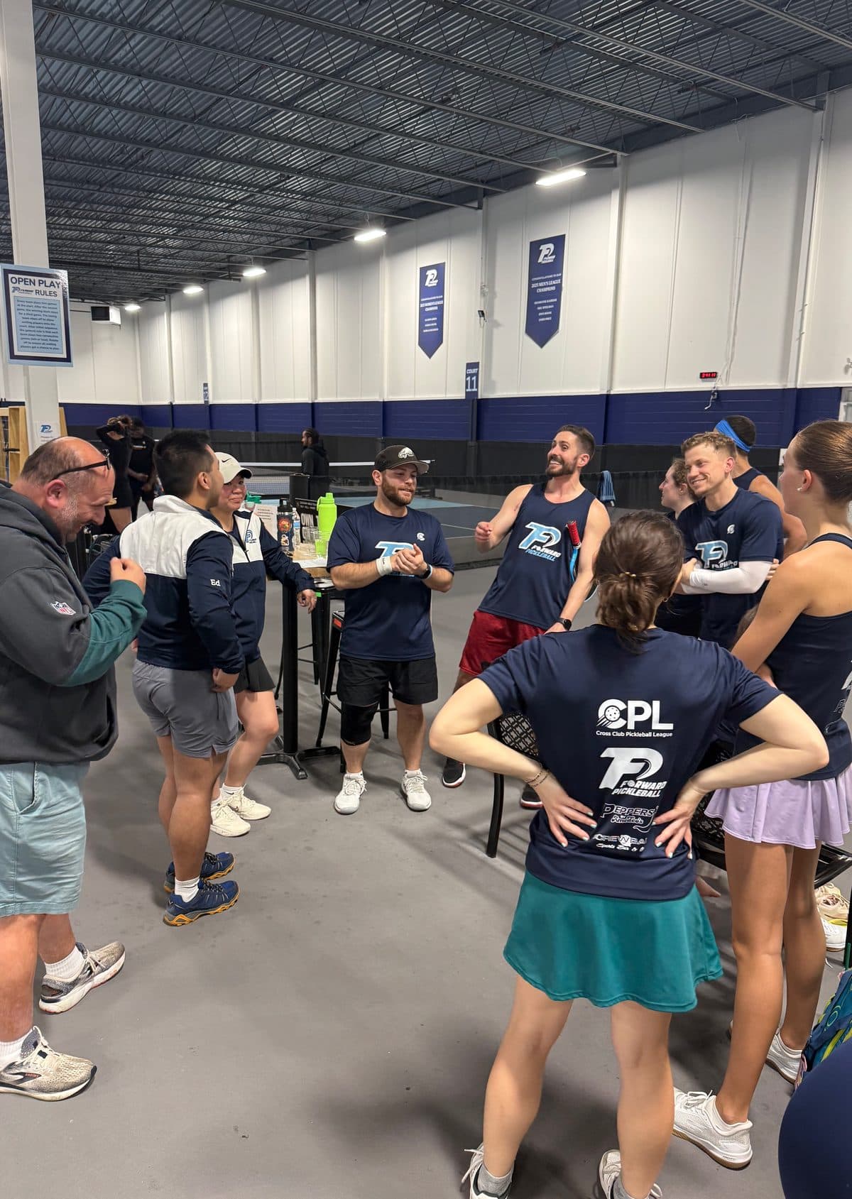 Group of players gathered at Forward Pickleball